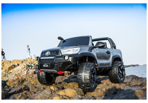 AUTO NA AKUMULATOR DLA 2 DZIECI TOYOTA HILUX 4X4 PILOT EVA SKÓRA LED RADIO MP3