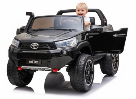 AUTO NA AKUMULATOR DLA 2 DZIECI TOYOTA HILUX 4X4 LAKIER PILOT EVA SKÓRA LED RADIO MP3