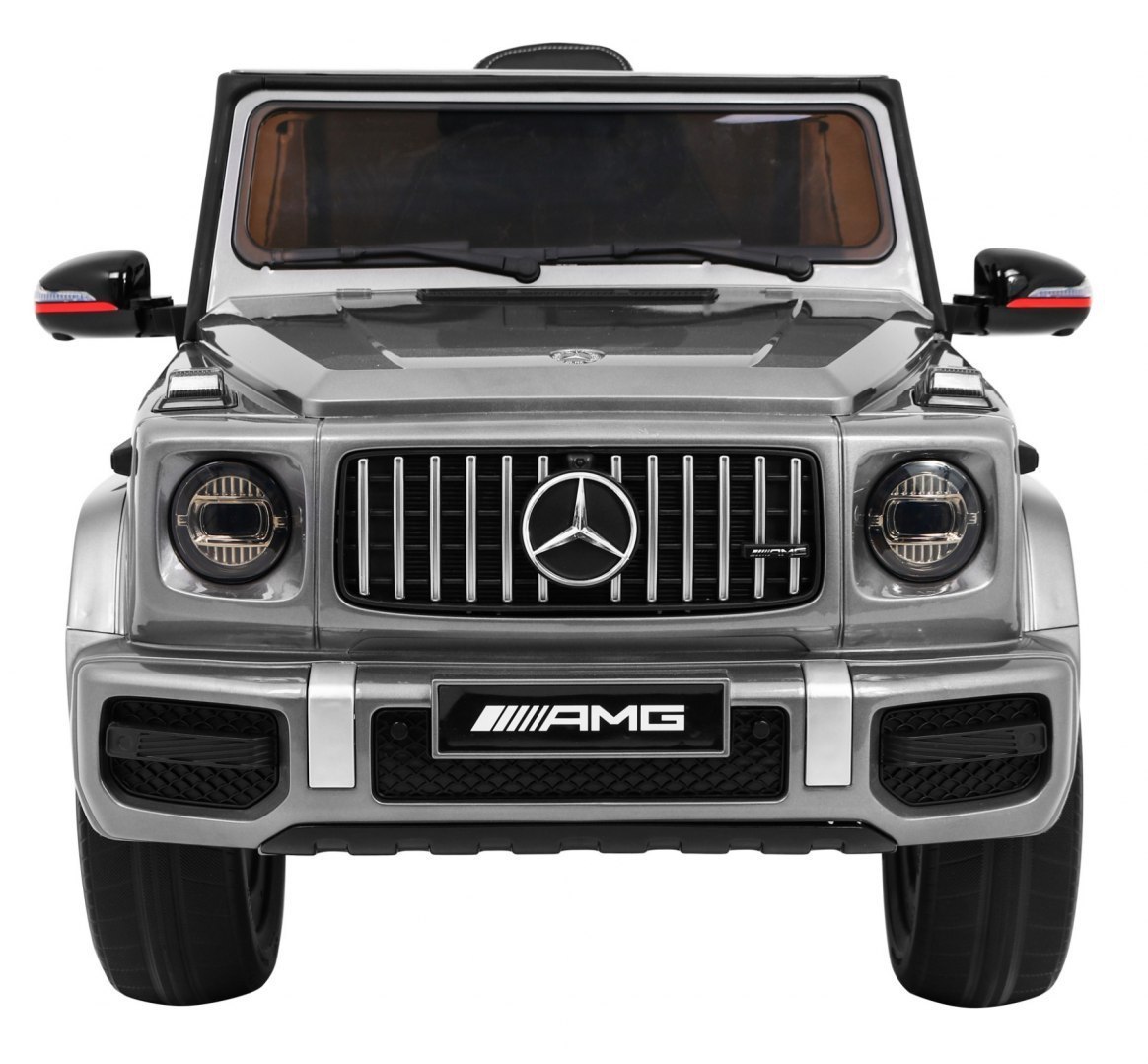 Mercedes AMG G63 dla dzieci Lakier Srebrny + Pilot + MP3 LED + Wolny Start + EVA + Pasy Mercedes AMG G63 dla dzieci Lakier Srebrny + Pilot + MP3 LED + Wolny Start + EVA + Pasy