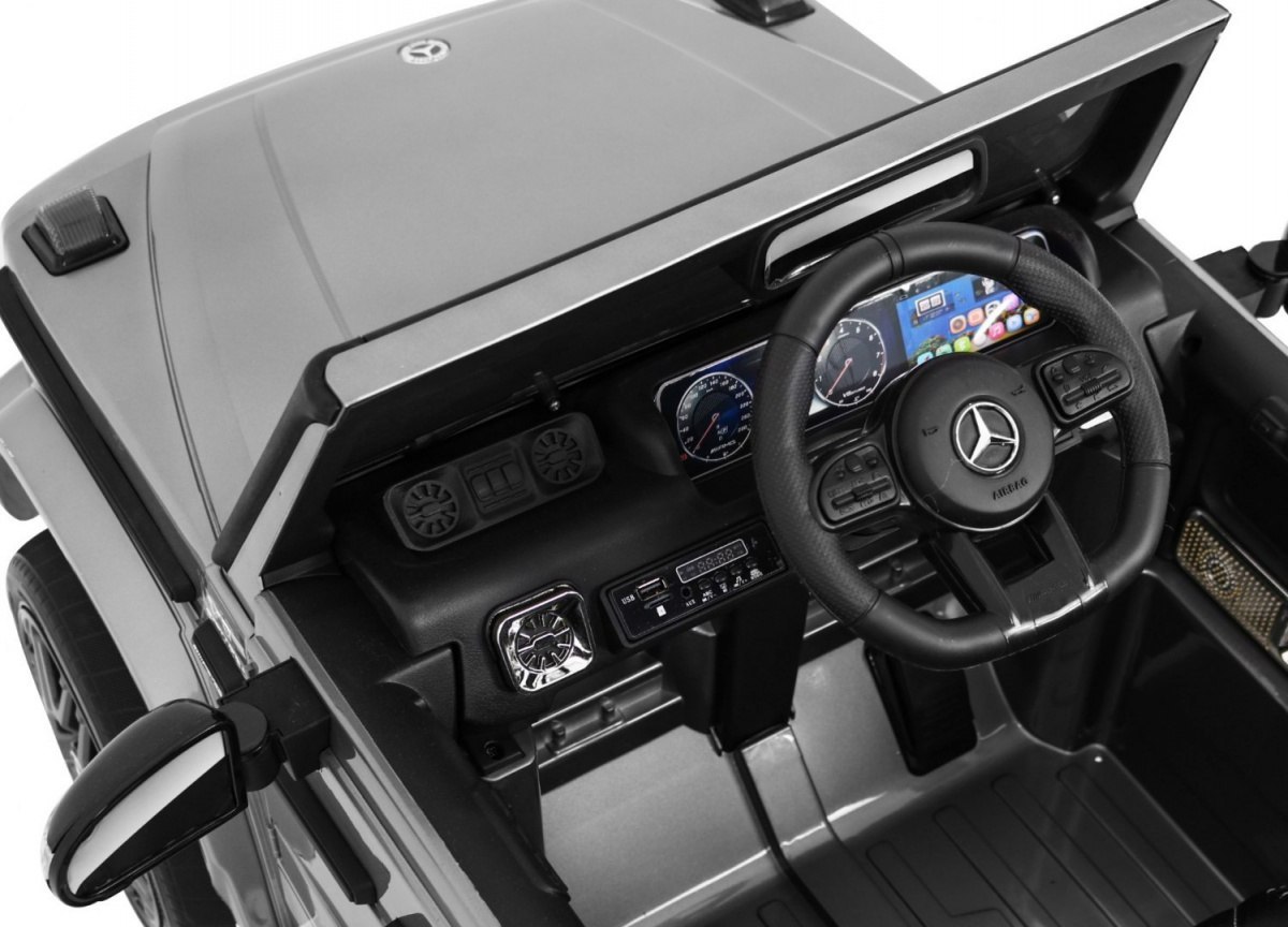 Mercedes AMG G63 dla dzieci Lakier Srebrny + Pilot + MP3 LED + Wolny Start + EVA + Pasy Mercedes AMG G63 dla dzieci Lakier Srebrny + Pilot + MP3 LED + Wolny Start + EVA + Pasy