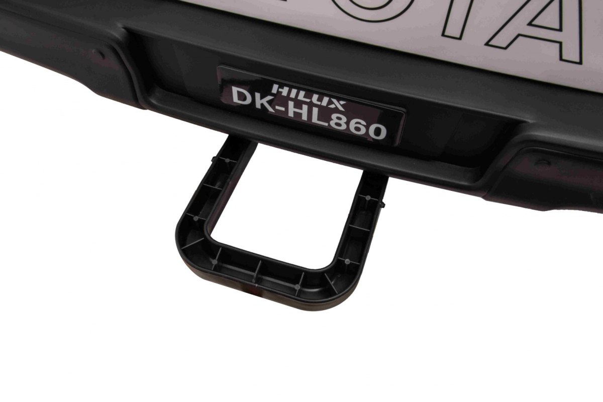 Toyota Hilux na akumulator dla dzieci Biały + Napęd 4x4 + Pilot + 2 bagażniki + Radio MP3 + LED Toyota Hilux na akumulator dla dzieci Biały + Napęd 4x4 + Pilot + 2 bagażniki + Radio MP3 + LED